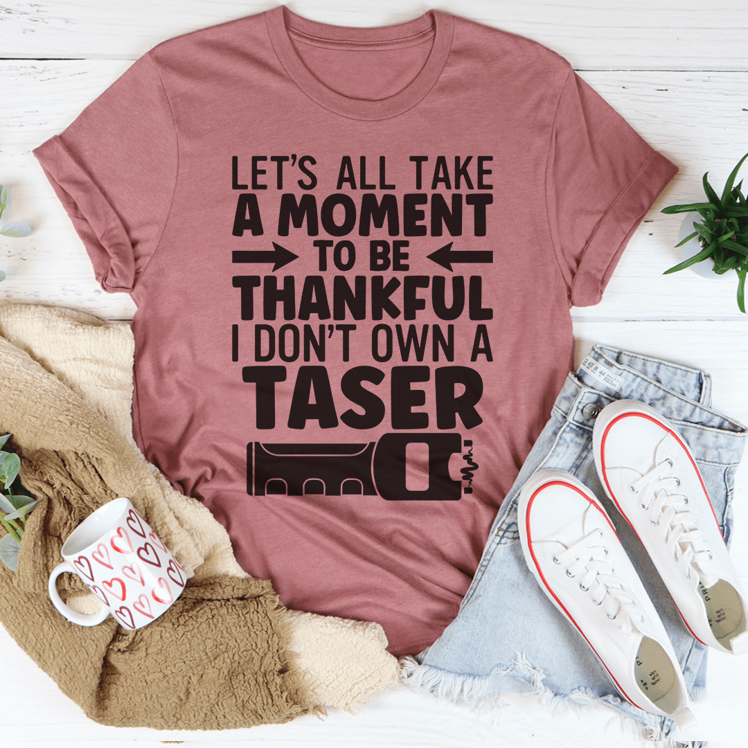 Mauve crewneck T-shirt with bold black quote graphic on the front