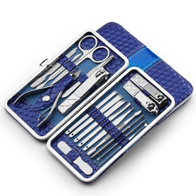 Stainless steel nail tool set in blue hard case, open with grooming tools