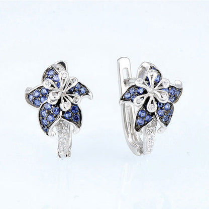 Blue and clear double-flower zircon stud earrings in silver-tone setting