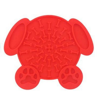 Red dog lick mat in a bone shape with paw-print feet and raised texture nubs