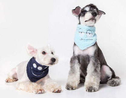 Cotton dog bandana scarf with light blue cyclops face design, worn by two small dogs