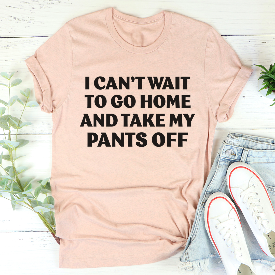 Peach crewneck T-shirt with large black “I CAN’T WAIT…” slogan print