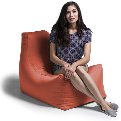 Coral outdoor bean bag patio chair with curved backrest and wide seat
