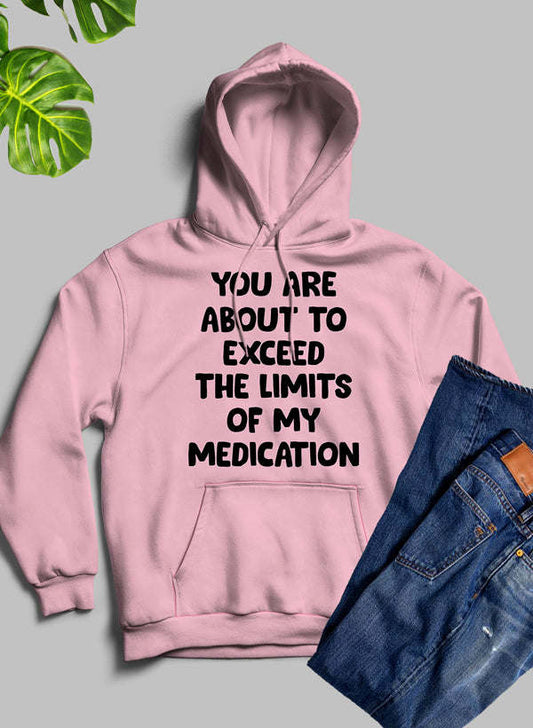 Pink pullover hoodie with front text graphic, hood and kangaroo pocket