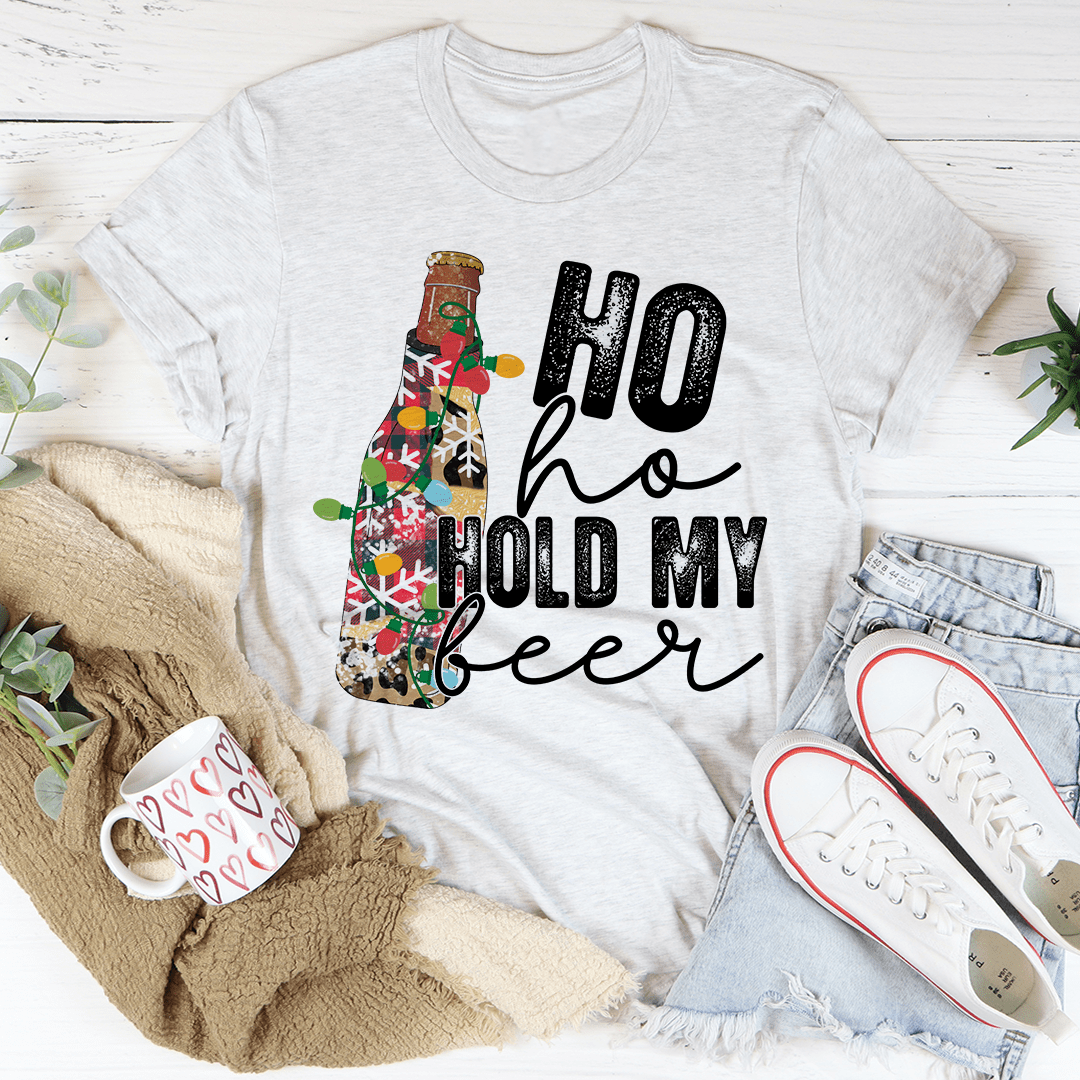 Light gray T-shirt with holiday beer bottle graphic and “Ho ho Hold My beer” text