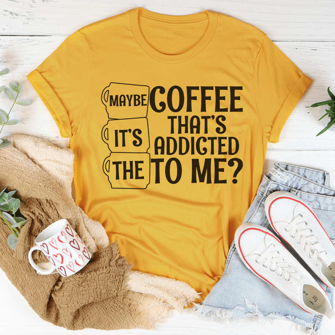Mustard yellow coffee T-shirt with black “Maybe Coffee It’s Addicted To Me?” graphic print