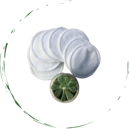 Light blue round reusable facial pads, soft stack of cloth circles.