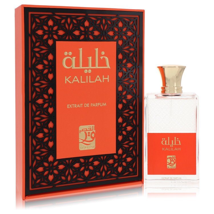 Unisex eau de parfum spray bottle with clear glass body, gold cap, and red box