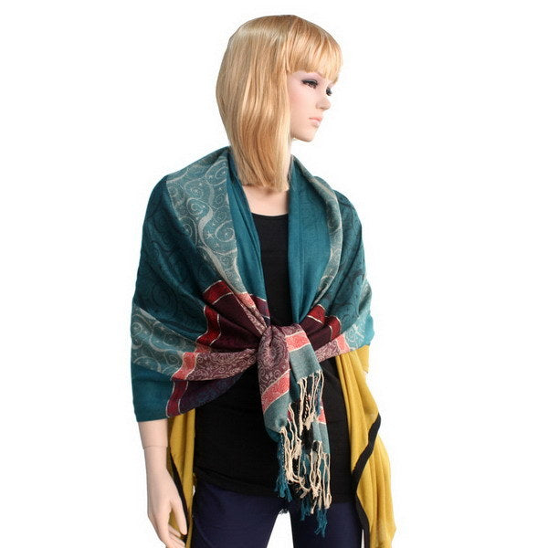 Pashmina shawl worn by model, teal and burgundy with fringed multicolor stripe.