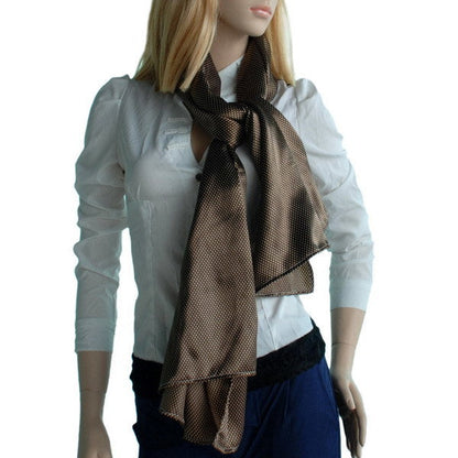 Brown polka-dot silk scarf tied at neck on model