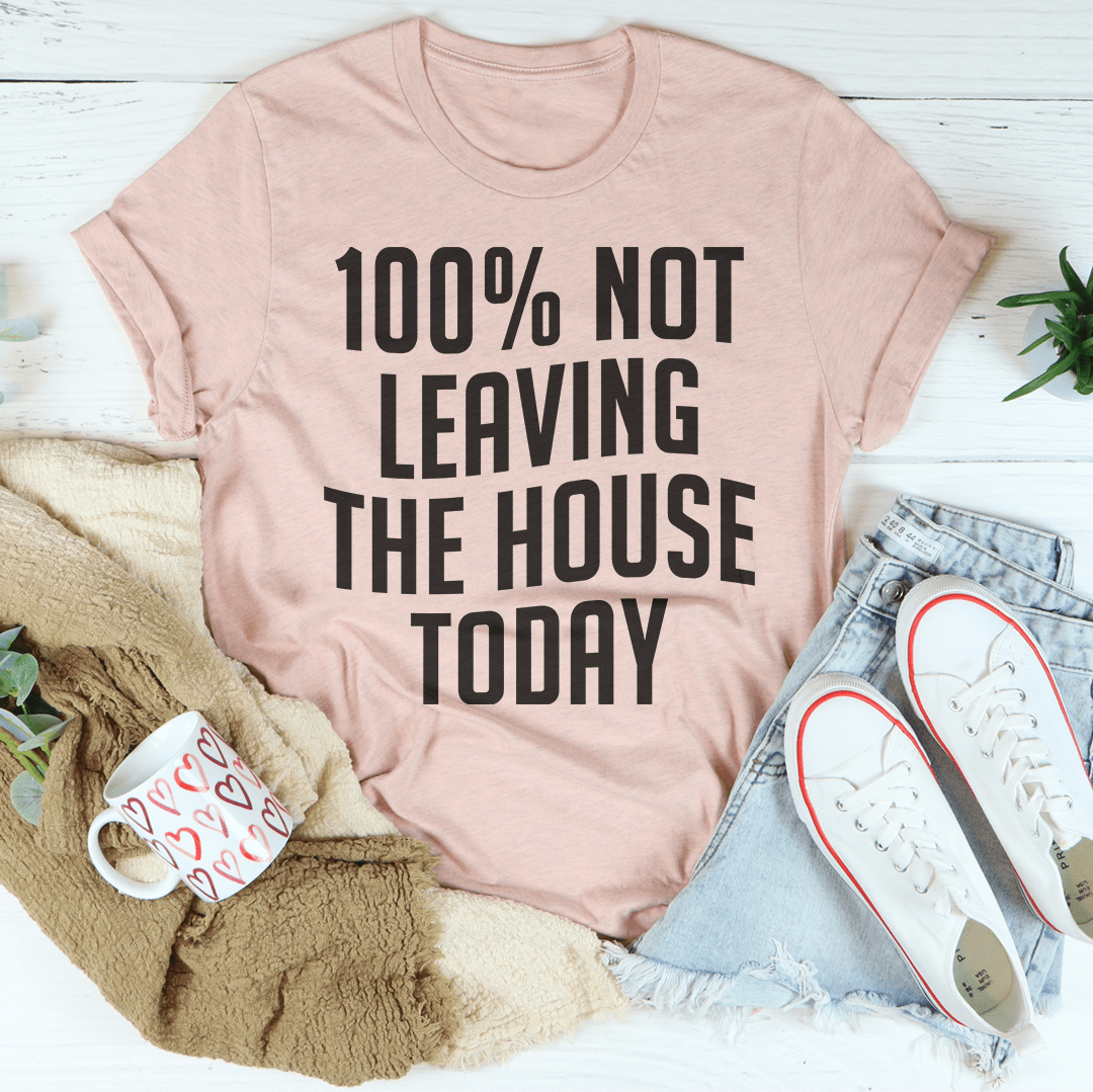 Light pink T-shirt with '100% NOT LEAVING THE HOUSE TODAY' graphic