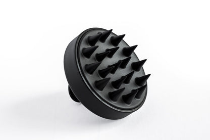 Black scalp massager head with flexible massage nubs
