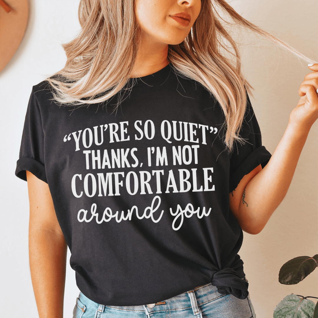 Black crew-neck T-shirt with white YOU'RE SO QUIET 'around you' text