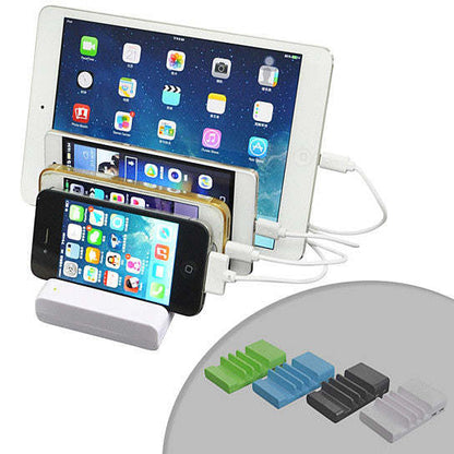 Smart device charger dock with white stand, black multi-port base, and colored tips