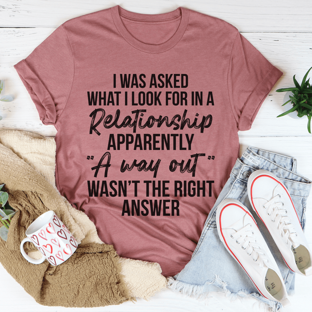 Mauve crewneck T-shirt with bold relationship quote graphic reading “I was asked…”