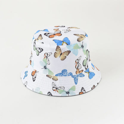 White fisherman bucket hat with blue butterflies and multicolor insect print
