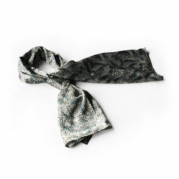 Leopard-print silk scarf in light and dark tones with a knotted design