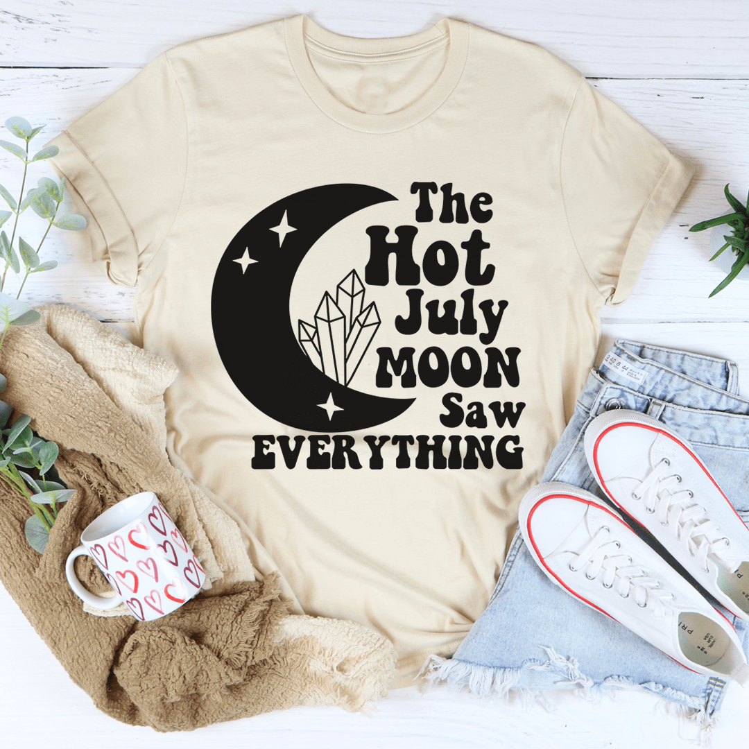 Cream graphic T-shirt with 'Hot July Moon' text and moon design.