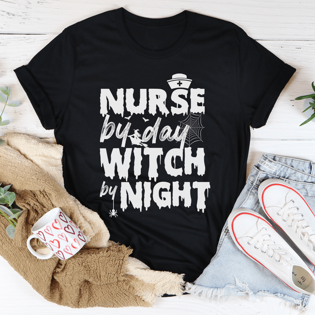Black crew-neck graphic t-shirt with “Nurse by day Witch by night” print.
