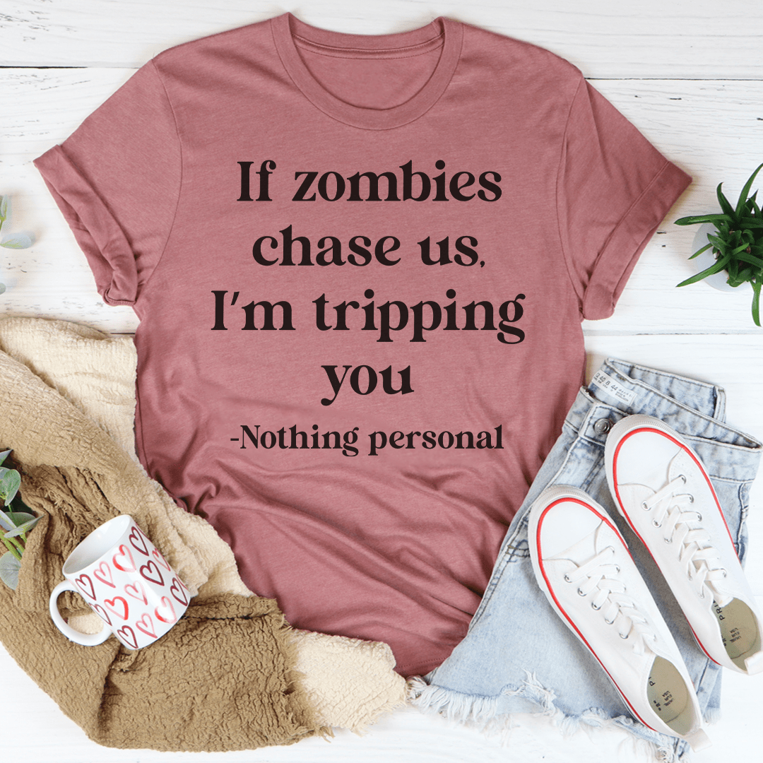 Mauve T-shirt with quote text: If zombies chase us, I'm tripping you; Nothing personal.