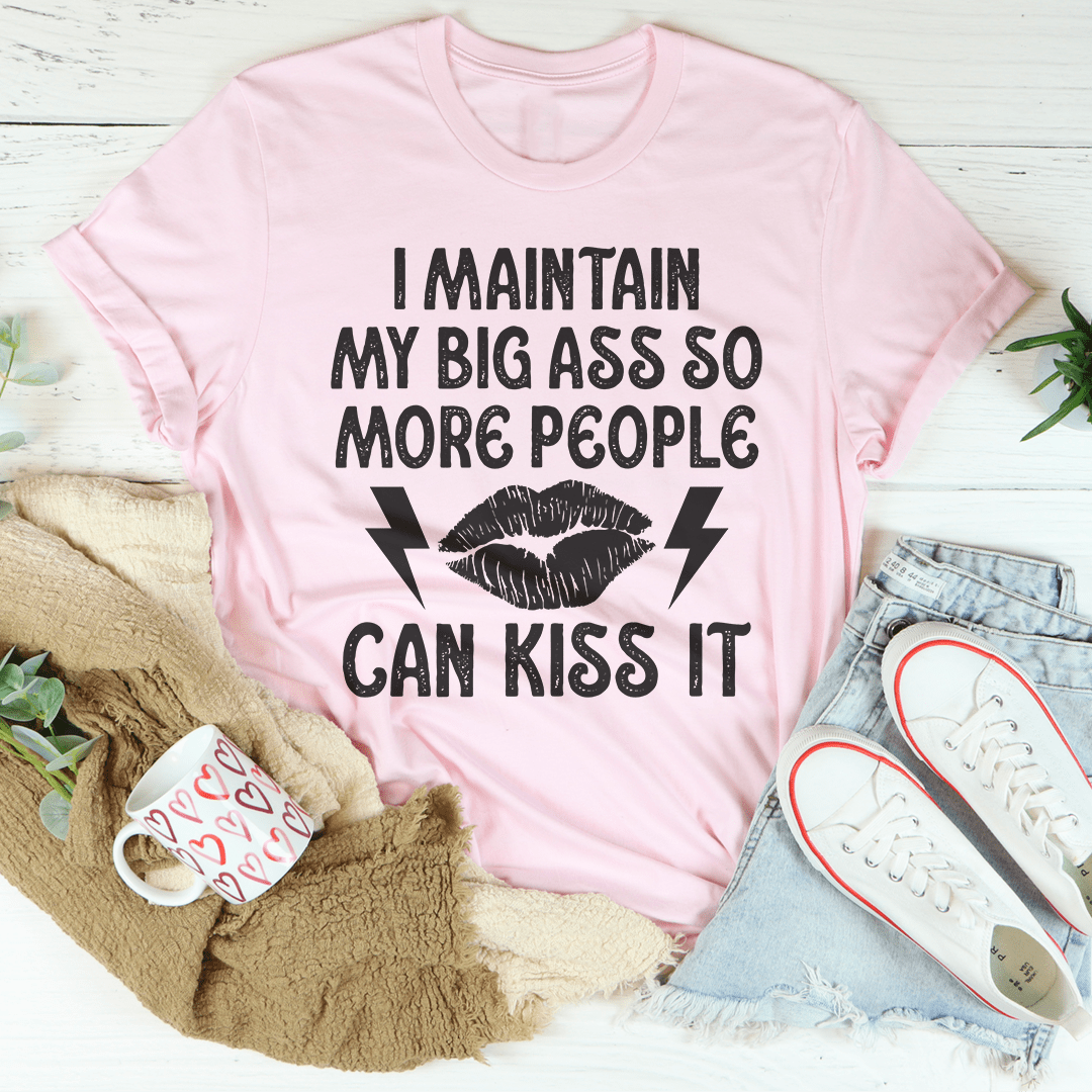 Pink crew-neck T-shirt with kiss-themed text and lips graphic on front