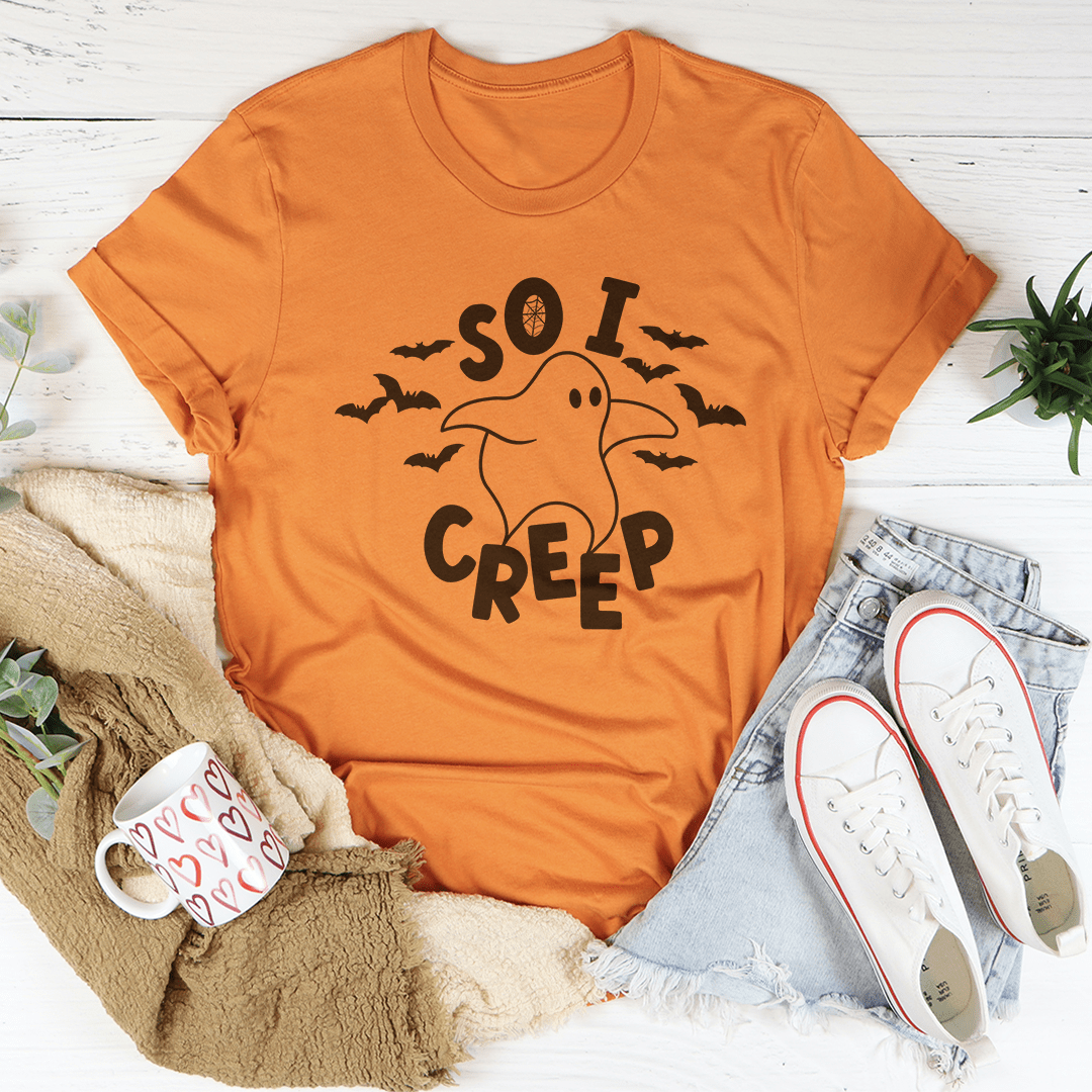 Orange short-sleeve T-shirt featuring a 'So I Creep' cartoon face graphic.