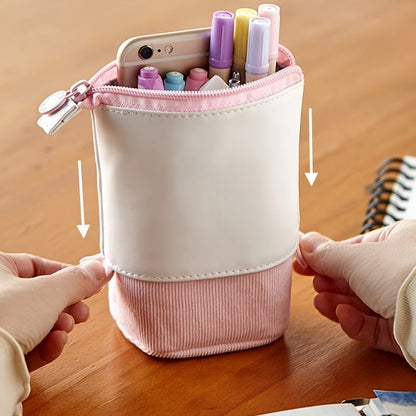 White-and-pink telescopic pen holder pencil case held open, showing pen slots