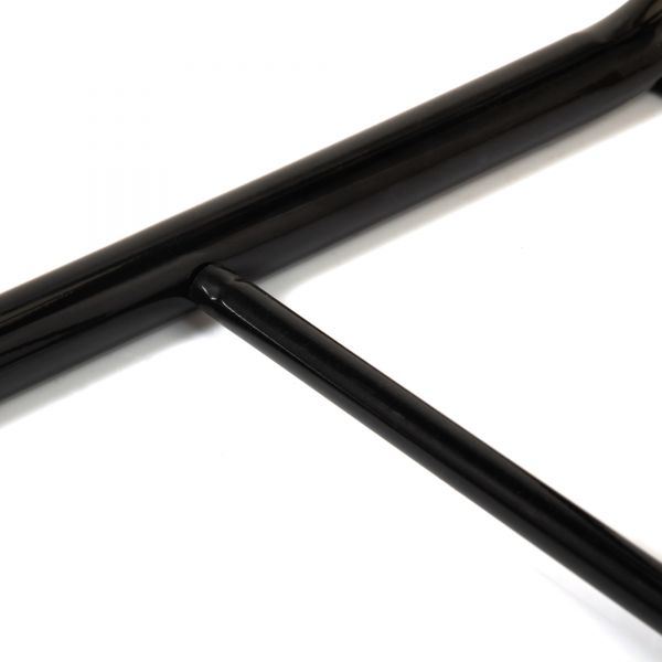 Black metal support bar and joint on a folding TV tray table