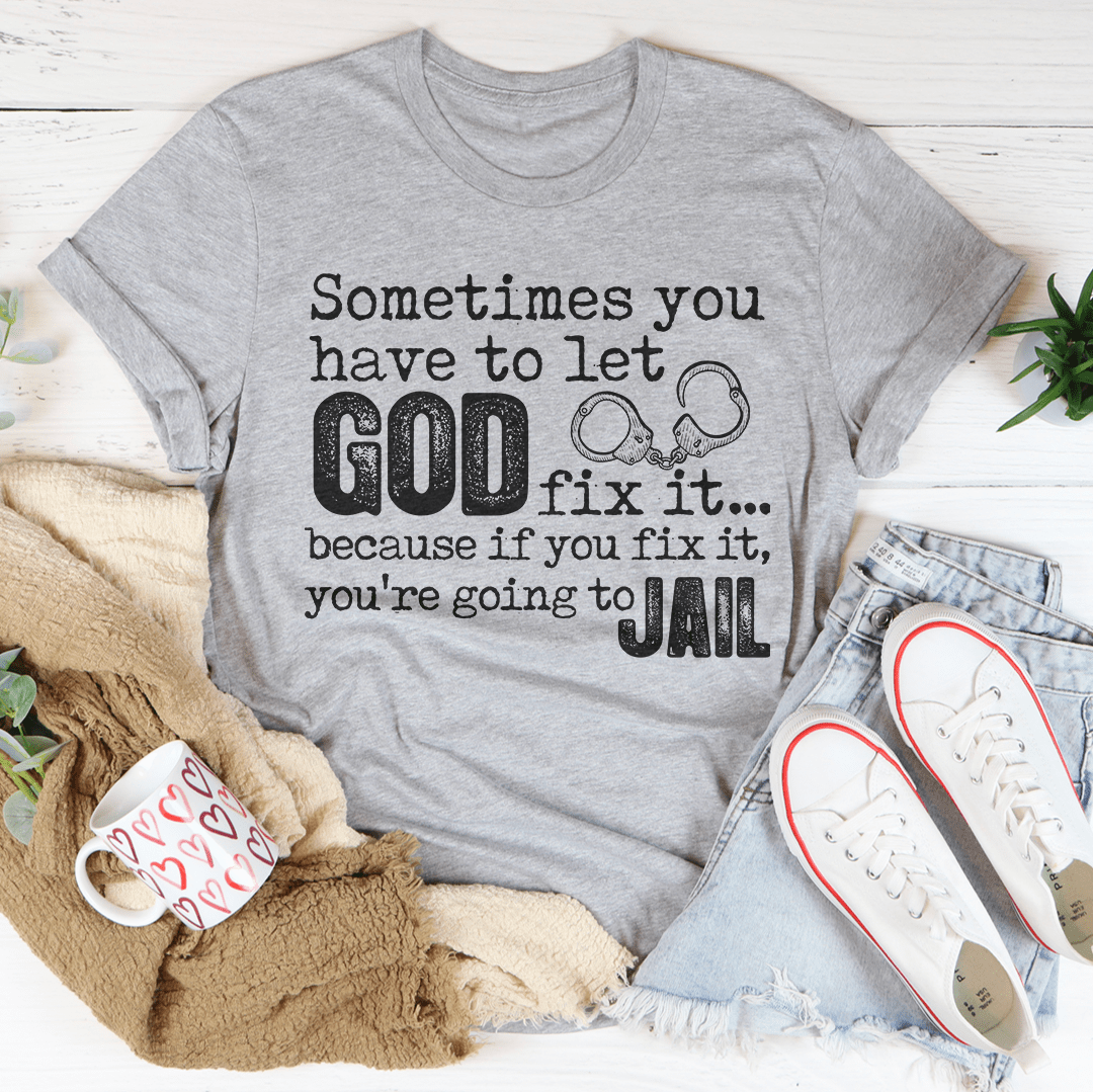 Athletic heather gray crew-neck T-shirt with 'GOD fix it...' and 'JAIL' graphic print