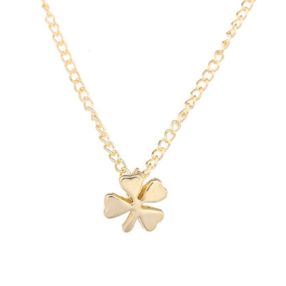 Gold-toned chain necklace with four-leaf clover charm pendant