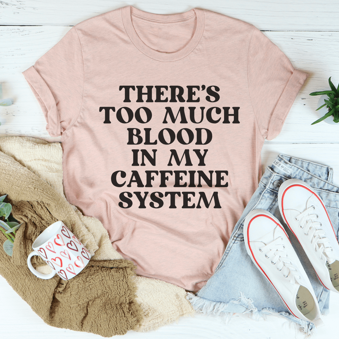 Mauve crew-neck T-shirt with bold black text graphic: 'There's Too Much Blood'