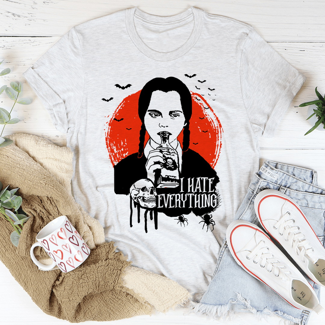 Light gray T-shirt with woman portrait, red halo, and 'I HATE EVERYTHING' print