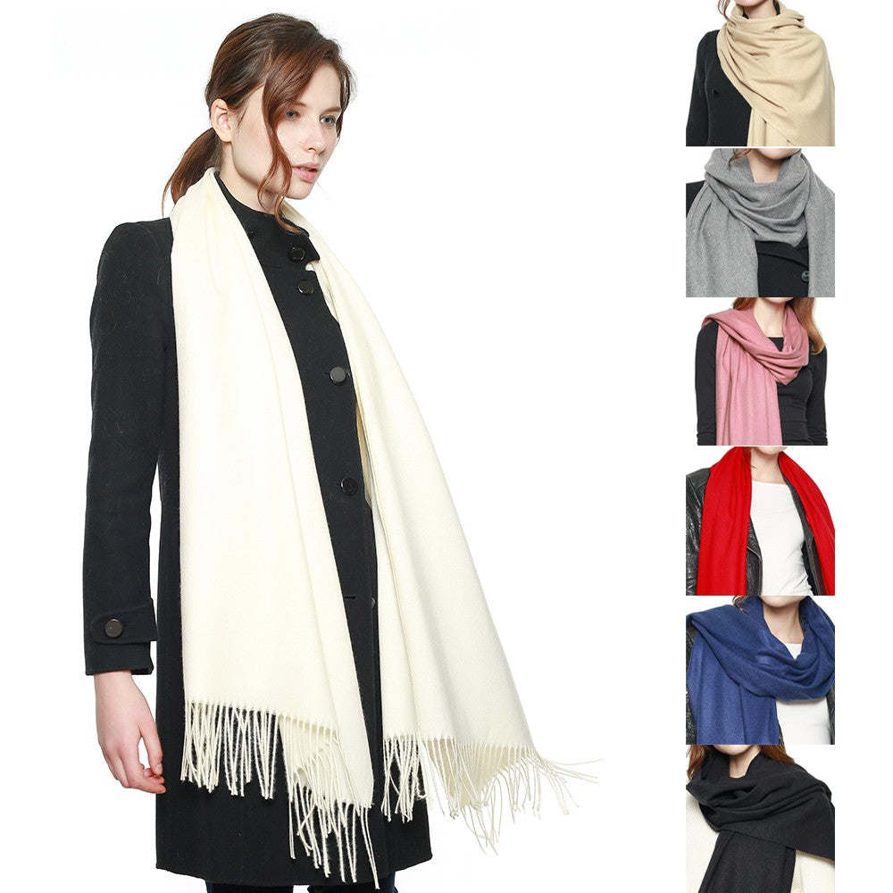 Off-white pashmina shawl with long fringe, worn with a front drape