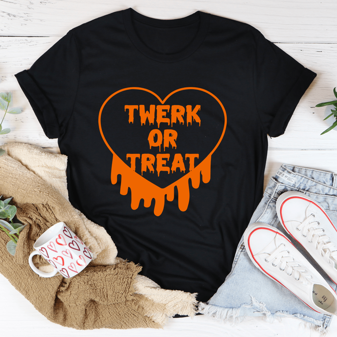 Twerk Or Treat graphic tee in black, orange heart "TWERK OR TREAT" drip print