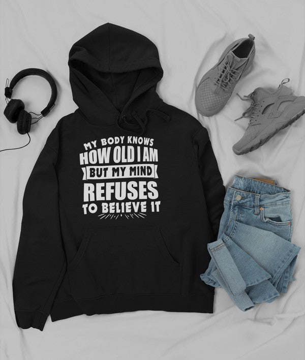 Black hoodie with hood and front pocket, white slogan graphic