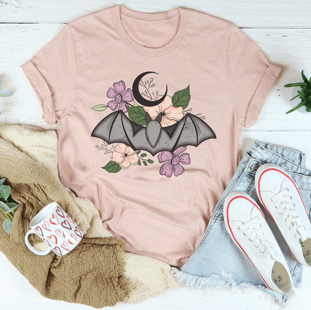 Blush pink T-shirt with floral bat graphic on the front