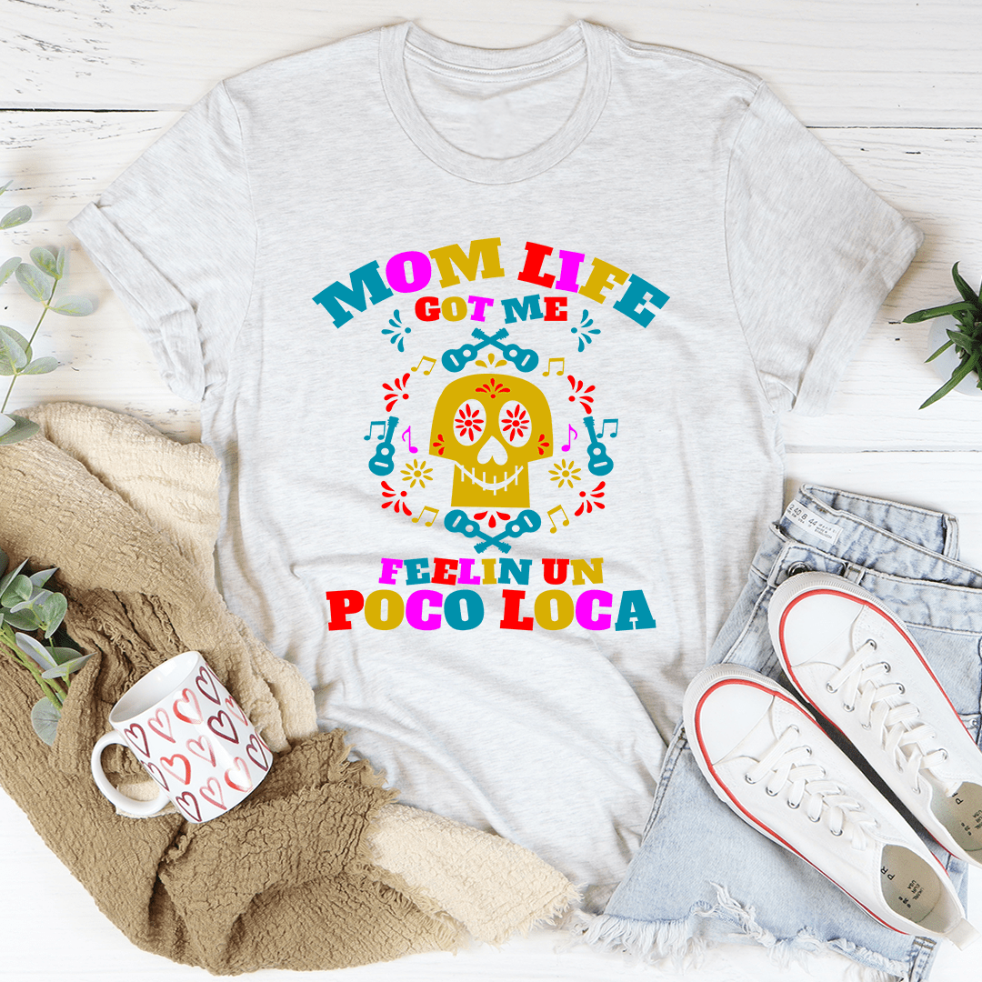 Light gray graphic crewneck T-shirt with colorful taco-style text and skull graphic