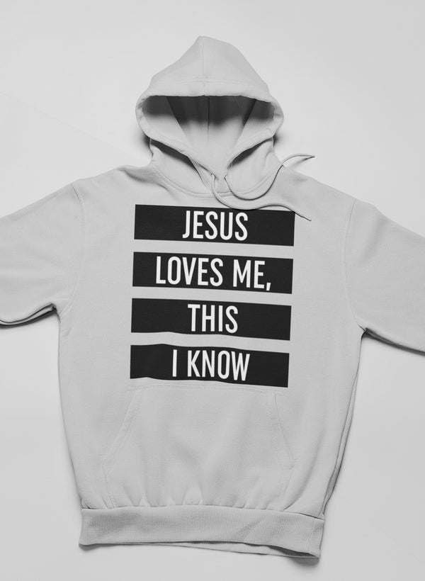 Light grey hoodie with stacked front text graphic: “JESUS LOVES ME, THIS I KNOW”