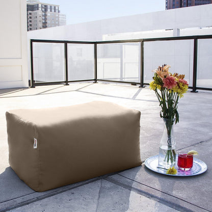 Taupe bean bag ottoman with visible side panel stitching