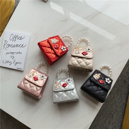 Assorted mini quilted crossbody bags with pearl handles in red, beige, pink, silver, and black