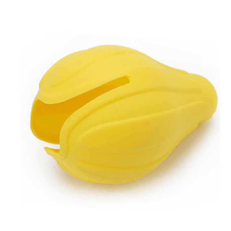 Yellow silicone manual citrus juicer press with hinged fold and nozzle opening