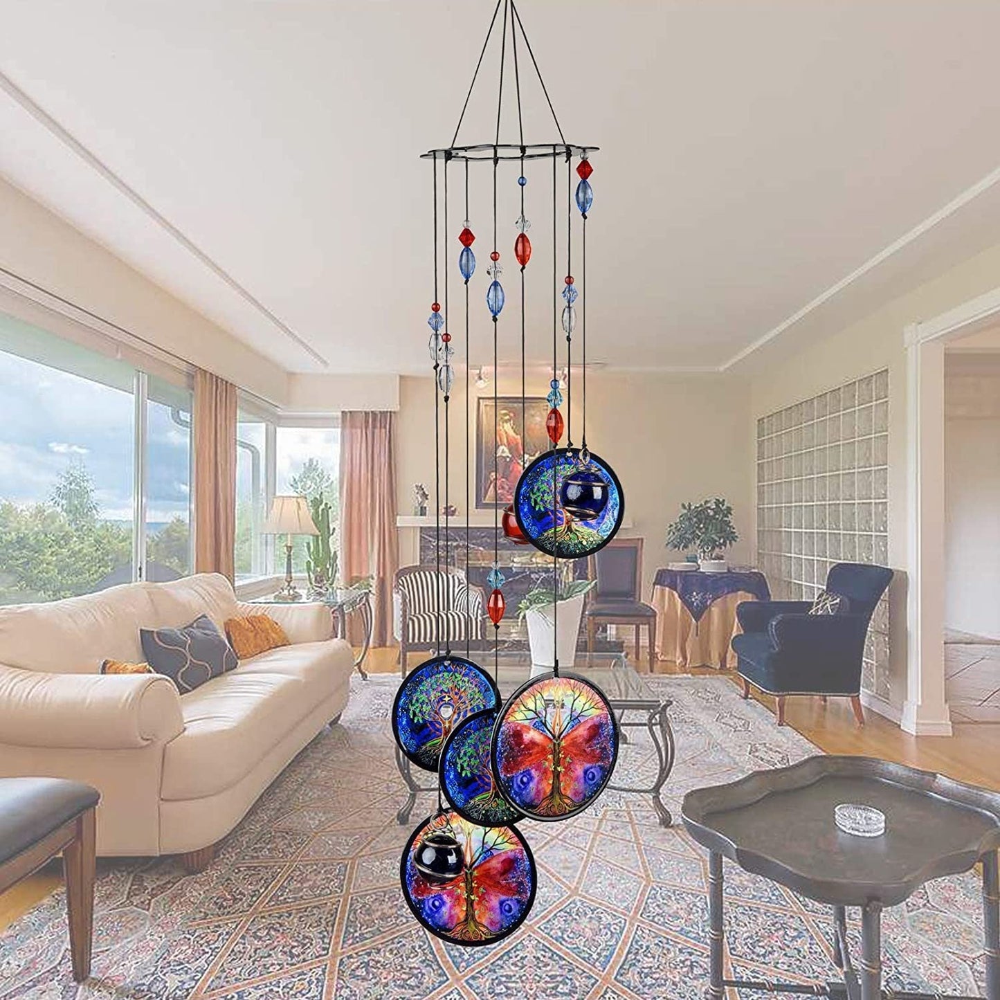 Blue metal wind chime with Tree of Life discs and red/blue crystal dangling elements