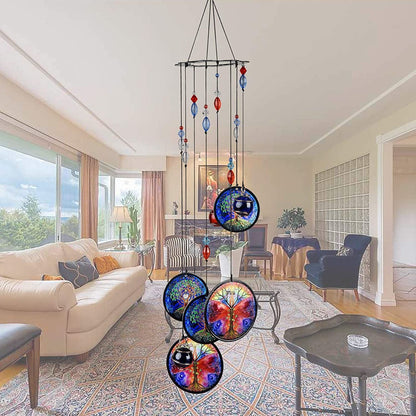 Blue metal wind chime with Tree of Life discs and red/blue crystal dangling elements