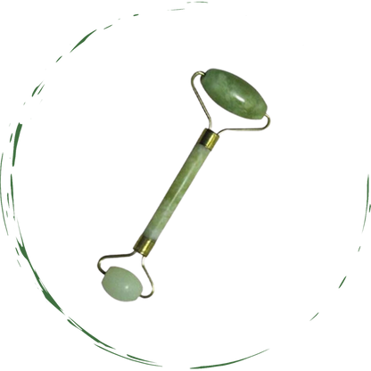 Jade facial roller with two green stones and gold-toned metal frame