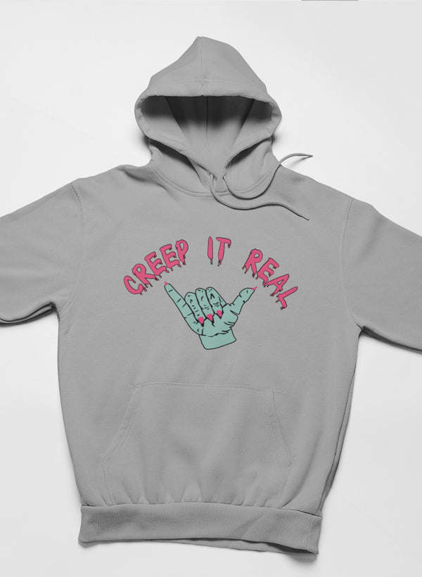 Light gray hoodie with front hood and hand graphic reading “Creep It Real”.