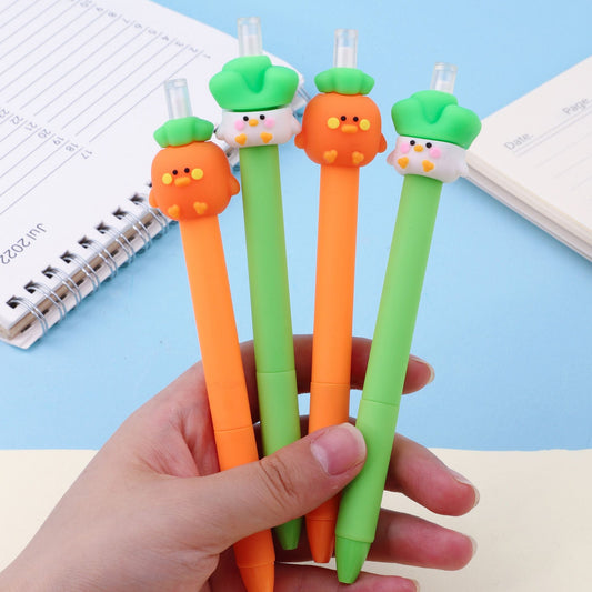 Vegetable-themed mechanical pencils with orange and green barrels, held in hand