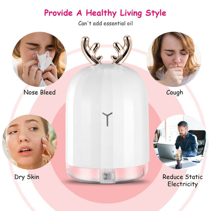 White cool mist humidifier with rose-gold antler top and glowing water base