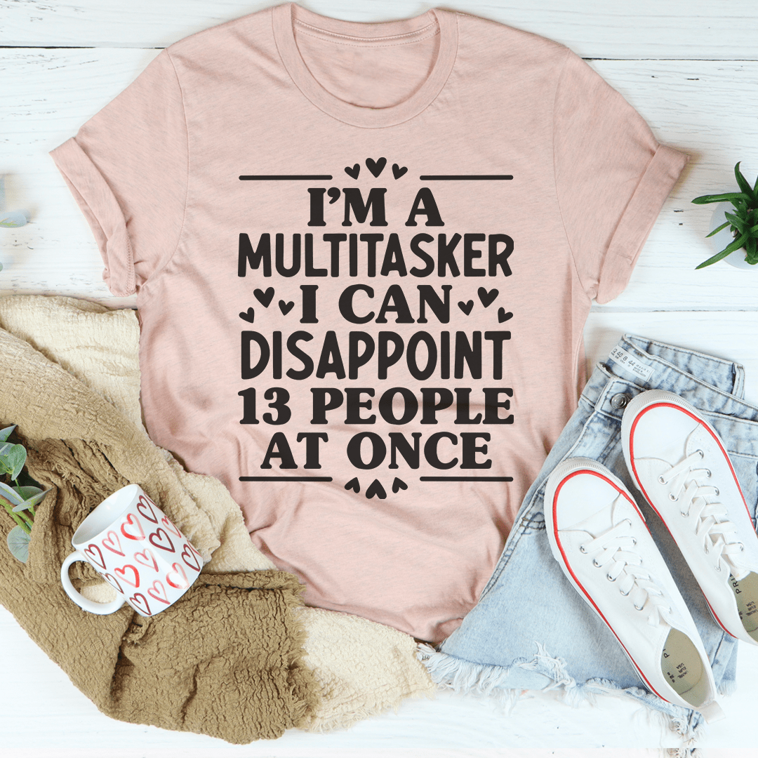 Mauve crewneck T-shirt with centered slogan print: "I'M A MULTITASKER" "DISAPPOINT"