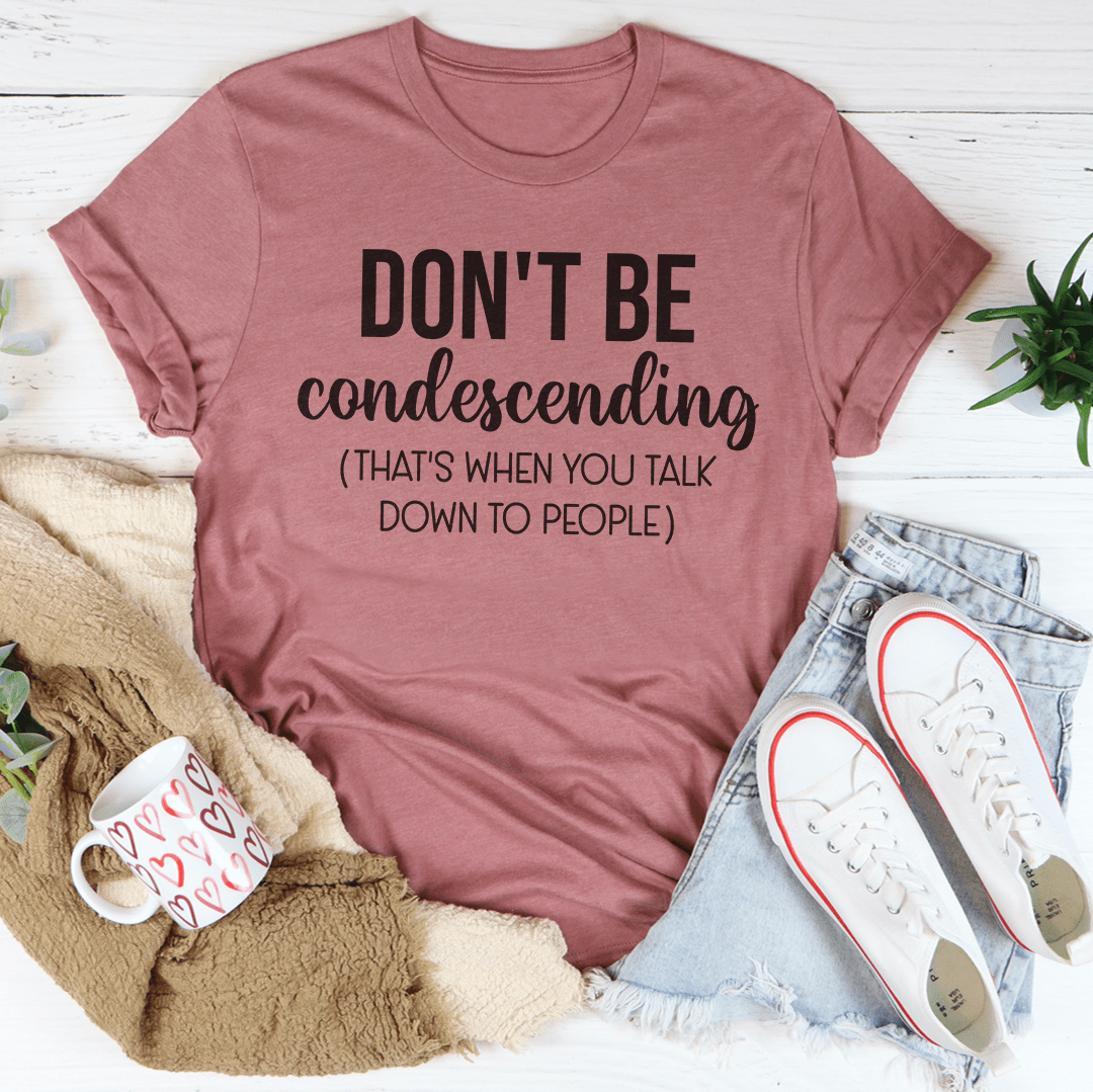 Mauve crew-neck T-shirt with "Don't Be condescending" message and quote lines