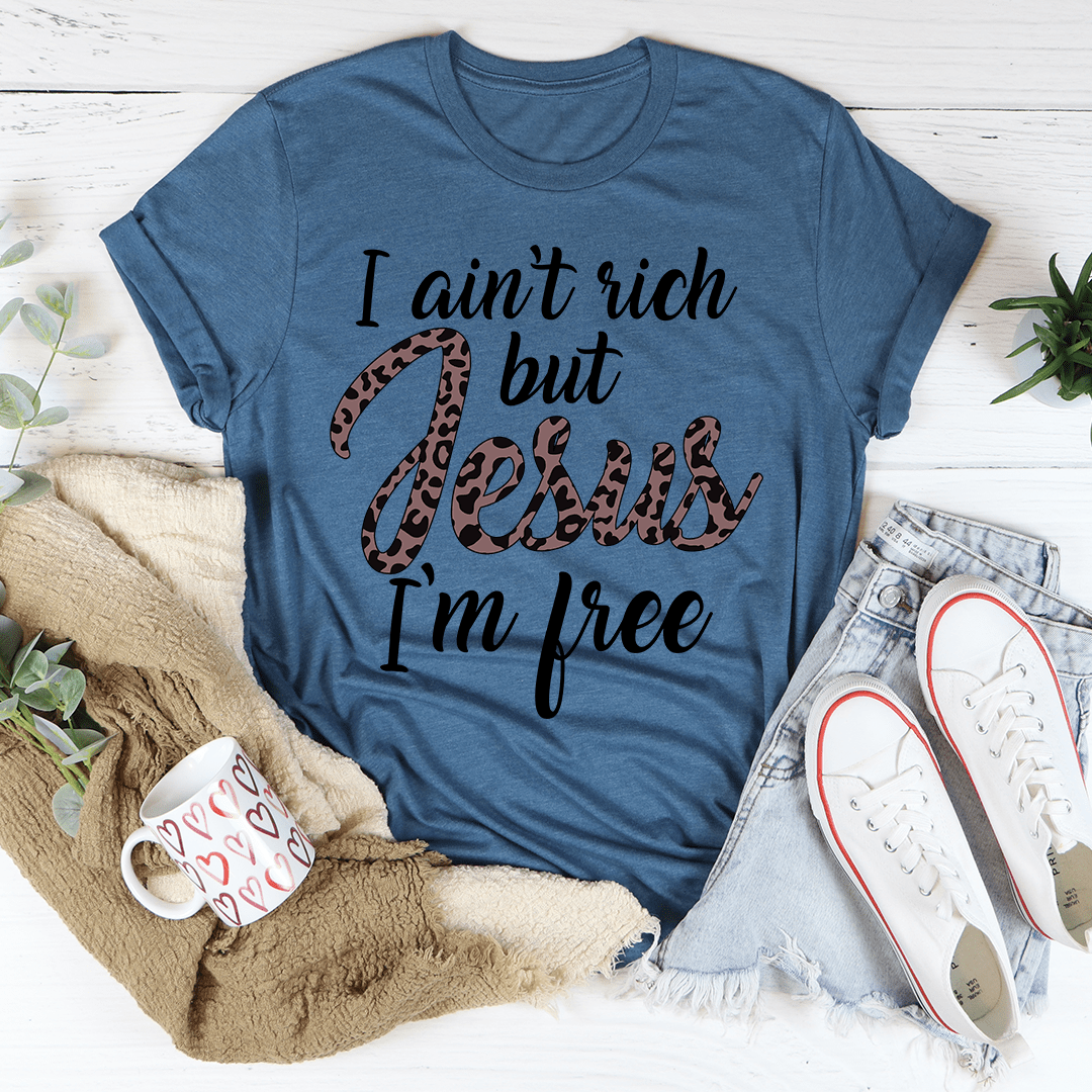 Blue graphic T-shirt: 'I ain't rich but Jesus I'm free' front print